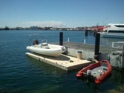 Rottnest ferry tender on a EZ BoatPort BP5001 air asssit dock