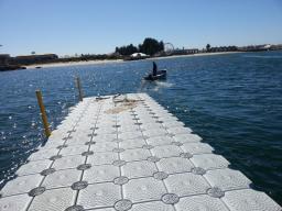 Dock under tow for positioning Bathers Beach Fremantle 